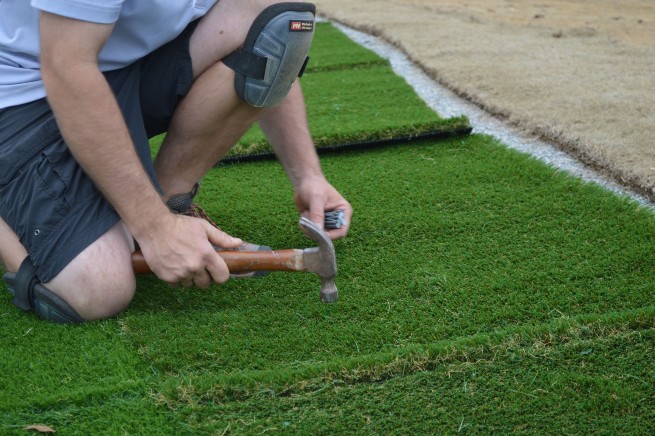 Greenwich artificial grass installation - infill